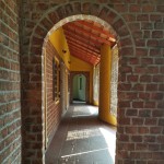 Exposed brickwork, Mangalore roof tiles and windows made from reclaimed wood.