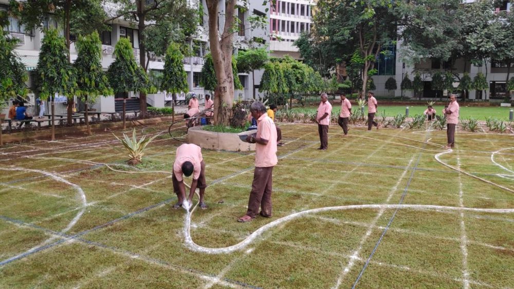 Marking the pathways with chuna (powdered lime)